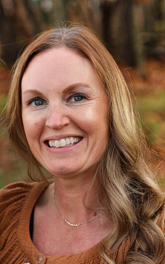 Headshot of dr. sarah malarney smiling